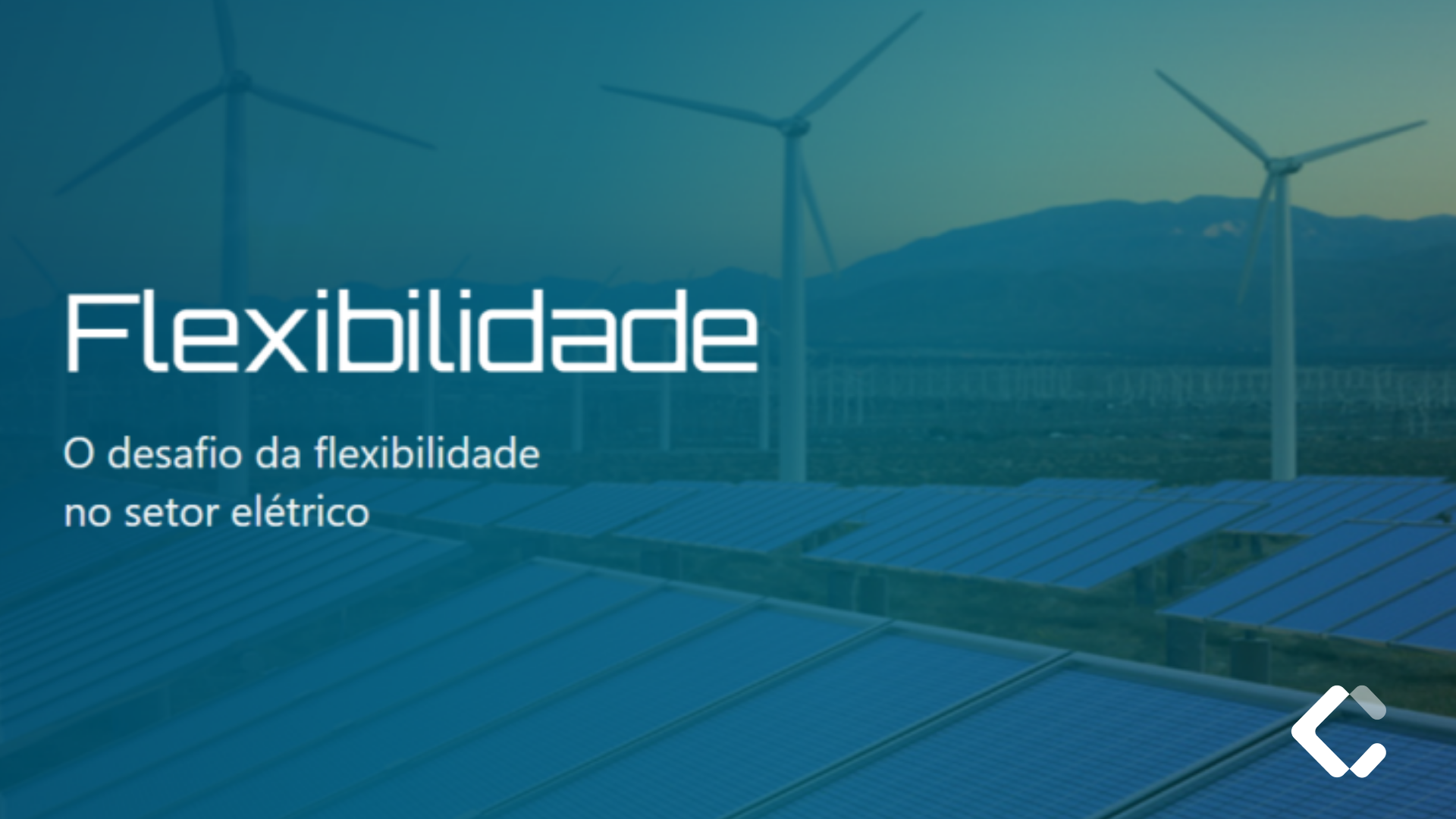 Torres de transmissão de energia elétrica e painéis solares ao fundo